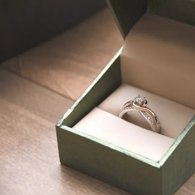 An engagement ring in an open box